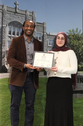 Noor accepting the SLRA certificate